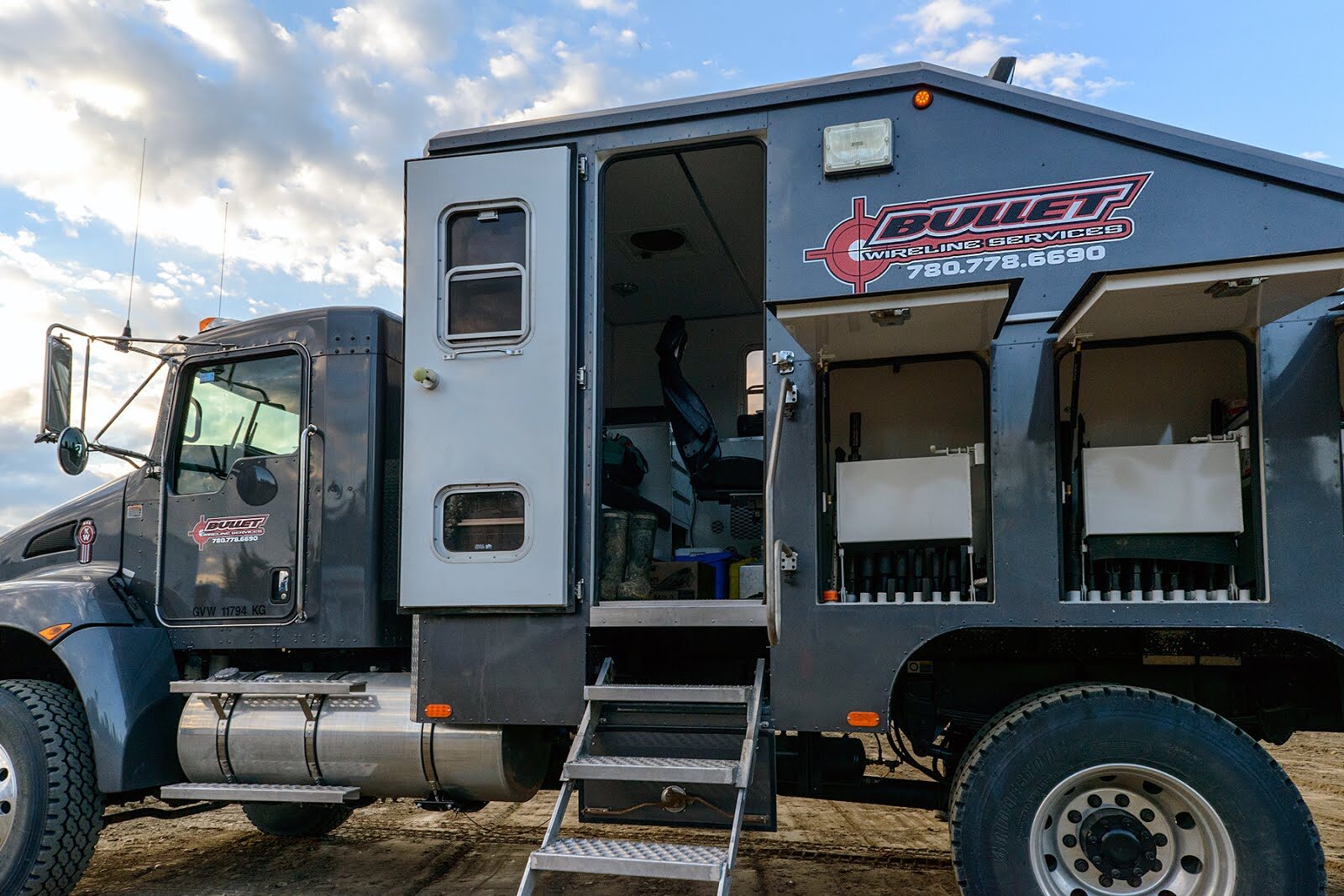 Bullet Wireline slickline unit staged at a wellsite near Whitecourt, Alberta